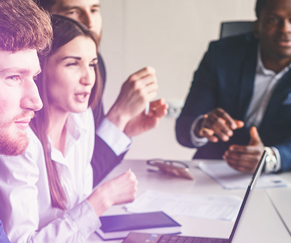 Image of a boardroom meeting of employees, representing how Accountivity can help employers get the best candidates for accounting and finance